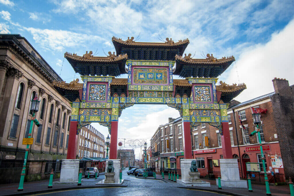 The Imperial Arch outside Liverpool's China town on Nelson Street, with two bronze lions in front.