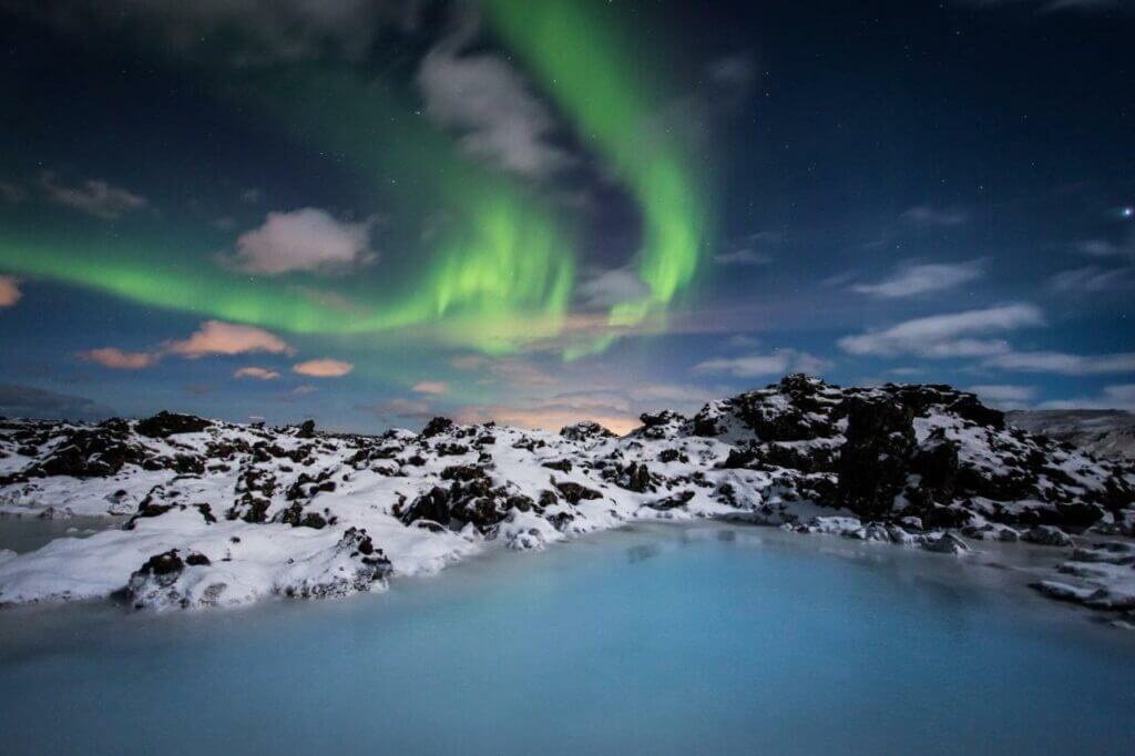 view of the northern lights over the blue lagoon at the retreat hotel